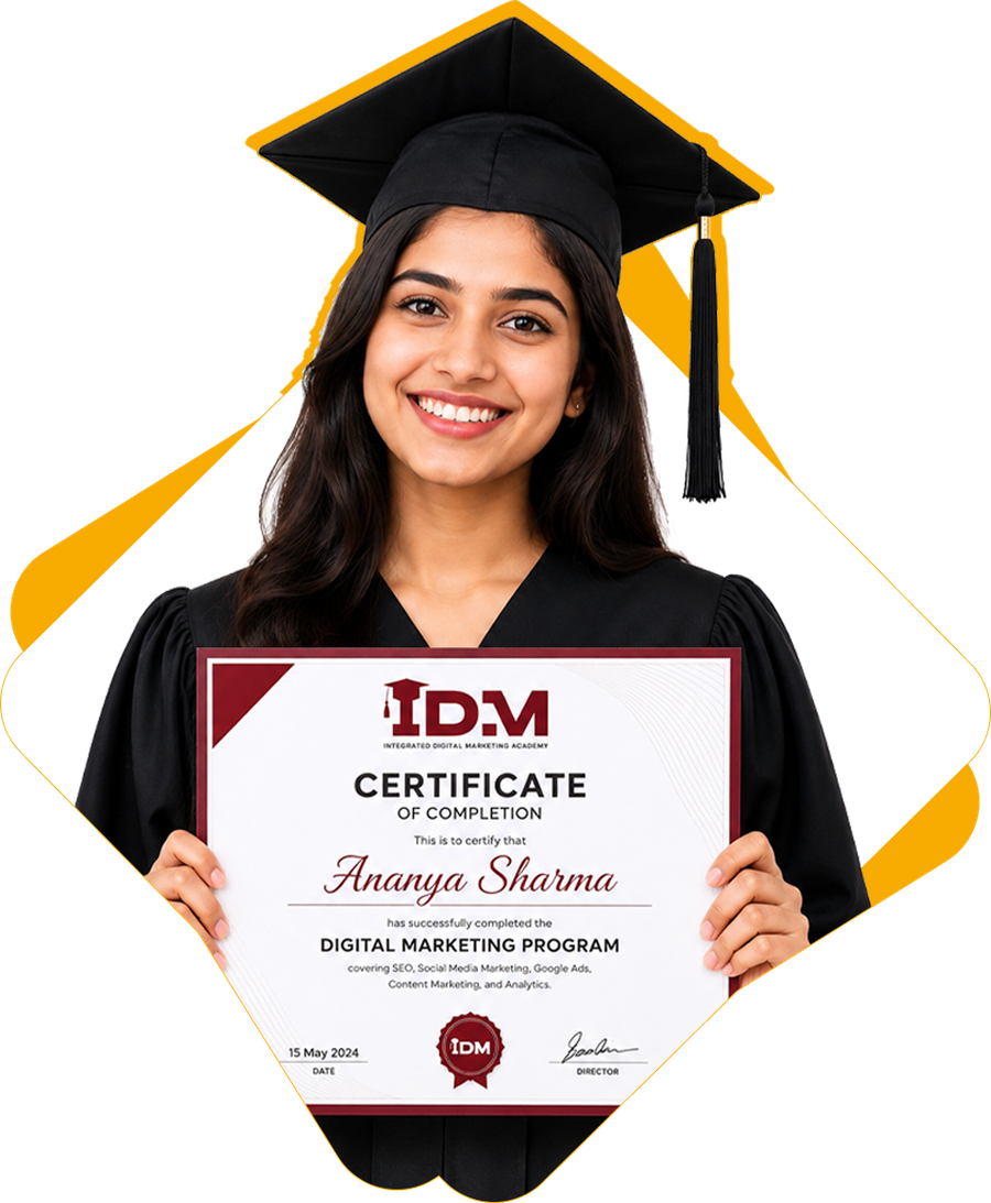 An IDM graduate holding their Certificate of Completion